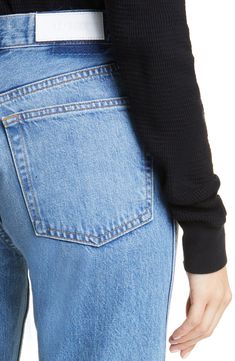 Re/Done takes the loose, straight-leg jeans of the '90s and recreates them for a whole new generation in a high-waist pair made from nonstretch cotton denim. 32" inseam; 16" leg opening; 12" front rise; 15" back rise (size 29) Button fly Five-pocket style 100% cotton Dry clean or machine wash, tumble dry Made in Italy or Turkey via C Spring Rigid Denim Flare Jeans With Straight Hem, Spring Straight-cut Rigid Denim Flare Jeans, Modern High Waist Cropped Jeans In Rigid Denim, Modern Rigid Denim Flare Jeans For Fall, Modern Rigid Denim Jeans For Spring, Modern Flare Jeans In Rigid Denim For Fall, Fall Denim Blue Cropped Mom Jeans, High Rise Tapered Cropped Jeans For Spring, Spring High Rise Tapered Cropped Jeans