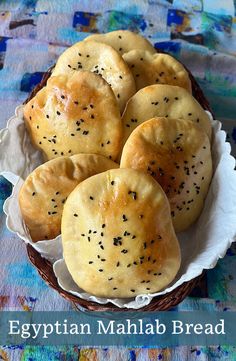 egyptian mahlab bread in a basket on a table with the title overlay