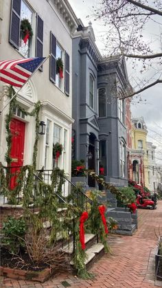 christmas wreaths adorn the front steps of homes in washington, d c's historic district