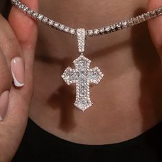 Introducing the Diamond Gothic Cross Pendant in 14k White Gold. This exclusive piece is fully iced out with hand-set stones in a detailed gothic cross design that will instantly elevate your look. Perfect for any occasion, this cross is a timeless symbol of faith and style. Pair it with the 3mm Diamond Tennis Necklace for a set that is guaranteed to shine! This product is guaranteed for life - GLD will repair the item should you experience any defects in craftsmanship or breakage. Specifications Luxury Silver Cross Necklace For Women, Luxury Diamond Cross Necklace Vvs Clarity, Luxury Black Cross Pendant Jewelry, Luxury Silver Cubic Zirconia Cross Necklace, Luxury White Cross Pendant Jewelry, Iced Out Diamond Cross Jewelry, Iced Out Diamond White Cross Jewelry, Diamond Cross Pendant Jewelry With Bling, Silver Iced Out Cross Pendant Necklace