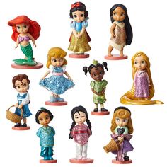 there are many princess figurines on the same item as they appear in this photo