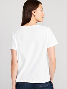 rib-knit v-neck short sleeves relaxed fit hits below waist models are approx.  5'9" and wear sizes s (size 4), l (size 12), and xl (size 18)Machine wash cold, tumble dry low.  cotton 100% White Cotton Short Sleeve V-neck Top, White Cotton V-neck Top For Everyday, White V-neck T-shirt For Everyday, Casual Everyday V-neck Top With Short Sleeves, Relaxed Fit Cotton V-neck Top With Short Sleeves, Relaxed Fit V-neck Graphic Tee, Casual Cotton V-neck T-shirt, White Short Sleeve V-neck Top For Everyday, Relaxed White V-neck Top