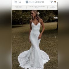 a woman in a white wedding dress standing on grass with her hands behind her back