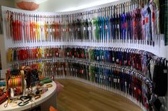 there are many different colored umbrellas on display