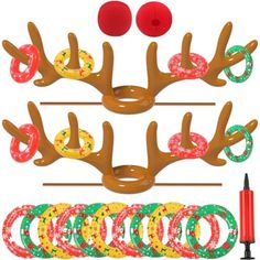 christmas reindeer antlers and rings are on display with markers, pens and pencils