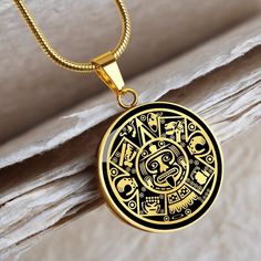 "This Aztec Mayan Calendar Necklace Is the Perfect Gift for all those Mayan lovers, Whether for Yourself or a Loved One.  Explore all our Witchcraft jewelry here: https://www.etsy.com/in-en/shop/SymbolicPresent?ref=seller-platform-mcnav&section_id=22613465 ➜ Our jewelry is made of high-quality surgical steel with a shatterproof liquid glass coating and an 18k gold finish option. ➜ Engrave onto the back of the Aztec Mayan Calendar pendant your loved one's name, your wedding date, an anniversary, Calendar Necklace, Aztec Necklace, Pisces Jewelry, Witchcraft Jewelry, Mayan Calendar, Jewelry Men, Chicano Art, Luxury Necklace, Glass Coating