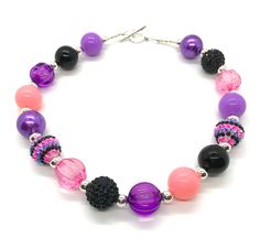 "Lightweight handcrafted 19\" necklace punches up any outfit.  Acrylic and metal beadwork accents your wardrobe with creativity and color.  Sophisticated purple, pink, black, and silver is both classic and contemporary.  Refresh that outfit and make it new again!" Pink Beaded Necklaces For Party, Pink Round Beaded Necklaces For Party, Trendy Purple Round Bead Necklace, Trendy Purple Round Bead Necklaces, Trendy Purple Beaded Necklace, Trendy Purple Necklace With Round Beads, Purple Beaded Necklace With Large Beads For Party, Pink Disco Ball, Pink Disco