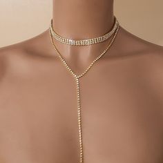 Gender:Women's; Gemstone:Rhinestone; Shape:Round; Style:Fashion; Jewelry Type:Choker Necklace; Material:Brass; Shipping Weight:0.1; Package Dimensions:12.010.03.0; Listing Date:09/12/2024 Gold Crystal Backdrop Necklace For Party, Gold Rhinestone Backdrop Necklace For Party, Glamorous Rhinestone Necklace For Wedding With Adjustable Chain, Adjustable Rhinestone Necklace With Bling, Adjustable Bling Rhinestone Necklace, Gold Crystal Necklaces With Rhinestones, Dazzling Gold Crystal Necklaces With Rhinestones, Adjustable Gold Rhinestone Necklace For Wedding, Gold Cubic Zirconia Crystal Necklaces For Party