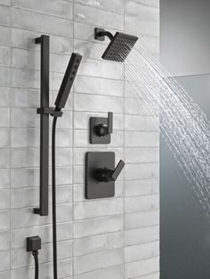 a shower head with thermostaer and faucet connected to it's side