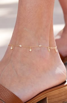 Shining cubic zirconia draws the eye to a dainty chain anklet gleaming in 18-karat-gold plating. 9" length; 1" extender Sterling silver/18k-gold plate/cubic zirconia
 Made in Turkey Delicate Anklets, Gold Ankle Bracelets, Ankle Bracelets Gold, Anklets Indian, Ethereal Jewelry, Diamond Anklet, Anklet Gold, Leg Chain, Dubai Style