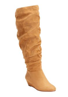 High and mighty this tall boot is a stunner! Wear it over slim jeans and a boho blouse to complete your look. Suede-like upperFull inside zipper for easy on/offInside elastic gore for comfort Flexible, skid-resistant outsole for a better grip           19" shaft heightWide calf: 17 3/8"-20 1/4" shaft circumferenceNote: Measurements based on size 7 boot. For each full size larger, circumference increases by 1/2"1 ¾" heel heightClick here to shop regular calf sizing! Suede-like wide calf bo Wedge Dress Shoes, Wide Width Shoes, Boho Blouse, Tall Boot, Wide Calf Boots, Wide Calf, Sport Sandals, Calf Boots, Tie Shoes