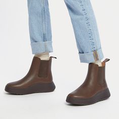 An elevated take on an icon. We've brought a closet staple bang up to date – setting a classic Chelsea boot upper on a superchunky (yet lightweight) sole. Clean. Contemporary. Crafted in smooth high-quality leather, with minimal seaming, and simple lines that complement almost any outfit. Thick stretch panels on both sides and pull tabs ensure easy on/off. Featuring a new flatform-version of our Microwobbleboard™ midsole to deliver unbeatable comfort, non-stop cushioning (and a little extra height). Cool Britannia with a modern edge. Fitting note: Please be aware that these boots have an 'average to slim' width fit, so may feel narrower than other styles on our Microwobbleboard midsole. Ankle-high Chelsea Boots For Streetwear In Fall, Ankle-high Chelsea Boots For Fall Streetwear, Everyday Fall Boots With Reinforced Heel, Everyday Ankle Boots For Winter, Everyday Winter Ankle Boots, Winter Everyday Ankle Boots, Everyday Winter Leather Boots, Fall Vibram Sole Platform Boots For Streetwear, Fall Streetwear Platform Boots With Vibram Sole