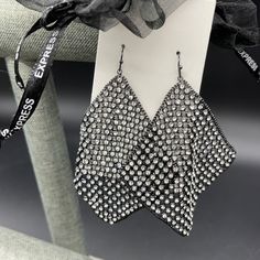 Express Wavy Chain Earrings - Nwt. Comes With Sheer, Black, Drawstring Gift Bag. Fun And Sparkly, These Gunmetal Gray Earrings As Style And Bling To Any Outfit. Metal Dangle Crystal Earrings For Party, Trendy Rhinestone Crystal Earrings For Evening, Trendy Crystal Rhinestone Earrings For Evening, Trendy Evening Crystal Earrings With Rhinestones, Trendy Party Earrings With Chain Detail, Evening Metal Chain Earrings, Bling Crystal Metal Earrings For Evening, Evening Metal Crystal Earrings With Bling, Chic Evening Earrings With Chain Detail