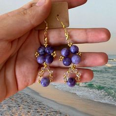 Women's earrings. Perfect for everyday use, perfect as a birthday gift or any other occasion. Perfect jewelry for yourself, wedding gift, bridesmaid, anniversary, birthday.🌈 The flowers are available in various shades of green, purple, blue. The pearls are oval in shape and white in color.🌈 The length is approximately 4 centimeters.📏 The chain and clasp are made of steel. Each jewel is supplied in a colored envelope, with a business card and free stickers, ready to be given as a gift.🌈 https Elegant Dangling Beads Earrings For Gift, Handmade Purple Chandelier Earrings As Gift, Wire Wrapped Chandelier Drop Earrings For Gift, Wire Wrapped Drop Chandelier Earrings As Gift, Purple Drop Chandelier Earrings As Gift, Handmade Purple Earrings For Her, Party Hypoallergenic Adjustable Beaded Earrings, Adjustable Hypoallergenic Beaded Earrings For Parties, Hoop Earrings With Dangling Round Beads For Gifts