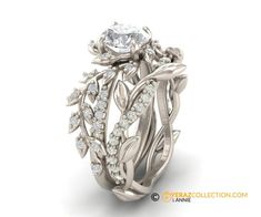 a wedding ring set with leaves and diamonds