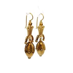 Step back in time with these exquisite Victorian drop earrings, truly a treasure from the 19th century. Crafted in 15 karat yellow gold, these antique earrings showcase the ornate detailing characteristic of the Victorian era. Each earring features intricate scrollwork and hollow elements that contribute to their lightweight feel, making them comfortable for all-day wear. These elegant drop earrings are perfect for anyone who appreciates the beauty of antique jewelry and the rich stories they hold. A timeless set of earrings that add a touch of history and elegance to any outfit! Antique 14k Gold Hallmarked Earrings, Antique Drop Earrings With Historical Design, Vintage Ceremonial Drop Earrings, Historical Yellow Gold Drop Earrings, Vintage Drop Earrings For Ceremonial Occasion, Yellow Gold Historical Drop Earrings, Victorian Hallmarked 14k Gold Earrings, Yellow Gold Drop Earrings With Historical Design, Traditional Yellow Gold Earrings With Historical Design