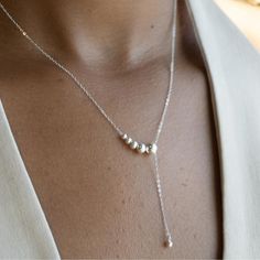 Discover our 925 Sterling Silver Necklace--a unique, minimalist delicate pearl pendant necklace, an ideal birthday gift for her or a thoughtful anniversary present. This affordable, adjustable chain jewelry is perfect for women--a versatile Mother's Day or best friend gift. Elevate your style with this modernist, delicate sterling silver necklace.  Chain Length- 16inch   Explore more necklaces within our collection -https://allurenl.etsy.com/listing/1656763227/ -https://allurenl.etsy.com/listing/1700699524/ -https://allurenl.etsy.com/listing/1704397932/ -https://allurenl.etsy.com/listing/1741792216/ Shipping & Satisfaction: We offer fast, reliable shipping for your convenience. Orders ships the next day from Netherlands. Local delivery in 3-5 days, and we ship internationally. Easily estim Modern Jewelry With Pearl Charm For Gifts, Sterling Silver Lariat Pearl Necklace With Pendant, Minimalist Dangle Charm Necklaces For Anniversary, Minimalist Dangle Charm Necklace For Anniversary, Minimalist Silver Lariat Pearl Necklace, Silver Minimalist Lariat Pearl Necklace, Minimalist Silver Clavicle Chain Necklace, Sterling Silver Pearl Drop Lariat Necklace, Elegant Lariat Necklace With Round Pendant