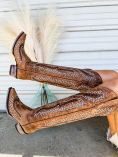 These cowboy boots are a must have in your closet. They are a literal staple piece. These knee high boots feature rhinestones throughout the boot. They are genuine leather handmade in Mexico. We recommend ordering your normal boot size as these do run true to size. Our model is 5'4 wearing a 9, her normal shoe size. Fashionable Cowgirl Outfits, Over The Knee Cowboy Boots Outfit, Western Boots Wedding, Knee High Cowboy Boots Outfit, Cowgirl Boots And Jeans, Cowgirl Boot Outfits, Over The Knee Cowboy Boots, Boot Wall, Western Footwear