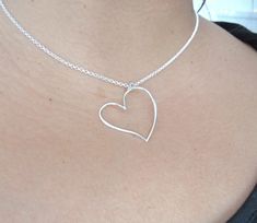 "This Dainty Heart Necklace is a handmade and unique piece. The perfect delicate piece to complement any outfit. This necklace is simply beautiful. We love to use it for couples or as a friendship necklace, it's the perfect piece to express love!❤️ *DETAILS* *Made with: -925 Sterling Silver - -Love *Measurements* - Chain: (16\" standard) -Chain Style: Round Rolo 2 mm. Made in Italy *QUESTIONS?* Any questions that you may have please contact us, we'll be happy to reply, you can send us a message Handmade Minimalist Heart Necklace For Valentine's Day, Cute Sterling Silver Necklaces For Valentine's Day, Cute Sterling Silver Jewelry For Valentine's Day, Handmade Heart Necklace For Wedding, Simple Heart-shaped Jewelry For Valentine's Day, Simple Open Heart Wedding Jewelry, Simple Double Heart Jewelry For Valentine's Day, Simple Open Heart Jewelry For Valentine's Day, Cute Heart Cut Jewelry For Valentine's Day