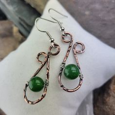 Stunning Green Jade Textured Copper Earrings, made with Textured Copper and Silver Wire. The perfect addition to your jewelry collection!  Great Energy These earrings are made with Beautiful Green Jade Gemstones, known for their happy and peaceful energy!  Featuring a simple yet elegant design, these earrings are carefully hand crafted with copper and silver wire, textured and oxidized to give this unique look! They are lightweight and comfortable to wear all day long. You can effortlessly be st Elegant Copper Teardrop Earrings Gift, Green Teardrop Metal Earrings, Pierced Green Copper Earrings, Green Copper Pierced Earrings, Elegant Copper Teardrop Earrings, Green Metal Teardrop Earrings, Elegant Green Copper Earrings, Wire Wrapped Drop Metal Earrings, Acrylic Nails Almond Shape