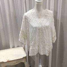 Ivory Must See In Person Elegant White V-neck Lace Top, Off White V-neck Blouse For Day Out, White V-neck Top With Lace Trim, White Lace Trim Top For Brunch, Elegant White Lace V-neck Top, Feminine Off-white V-neck Top, Feminine Off White V-neck Top, White Feminine Lace Top For Brunch, Feminine White Lace Top For Brunch