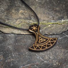 Engraved Viking Style Necklace, Black Engraved Jewelry For Festivals, Black Engraved Jewelry For Festival, Black Viking Engraved Jewelry, Traditional Black Engraved Necklace, Traditional Black Jewelry With Adjustable Cord, Triquetra Design, Viking Hood, Hammer Necklace