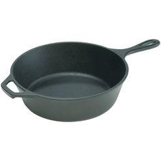 an empty frying pan on a white background