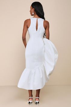 Make an ultra-chic entrance that no one will forget in the Lulus Magnificent Presence White Ruffled Asymmetrical Midi Dress! Satiny woven fabric shapes this outstanding dress that falls from a crew neckline and a sleeveless, princess-seamed bodice. The figure-skimming silhouette continues into a statement-making, high-low skirt that boasts a structured, asymmetrical ruffle detail that flares out at the side. Midi, bubble-hem completes the extravagant look, while a keyhole cutout at the back secu Asymmetrical White Dress, Midi Dress Satin, White Satin Dress, High Low Midi Dress, Asymmetrical Midi Dress, Tier Dress, Tiered Ruffle Dress, Bubble Hem, High Low Skirt