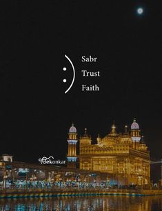 the golden building is lit up at night with words that read sabar trust faith