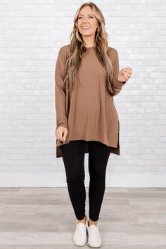 Any time you spend in this top will be well spent! This top is the perfect addition to your loungewear wardrobe! Crafted with a comfy, lightweight fabric blend, this neutral mocha top is perfect for all-day wear whether at home or out and about! Feel relaxed and comfortable all day long! 57% Polyester, 38% Rayon, 5% Spandex Comfortable Brown Tops For Everyday, Oversized Brown Soft Knit Tops, Neutral Soft Knit Crew Neck Top, Everyday Long Sleeve Brown Top, Brown Long Sleeve Top For Everyday, Casual Brown Soft Knit Top, Effortless Long Sleeve Neutral Tops, Casual Soft Knit Brown Tops, Effortless Neutral Long Sleeve Top