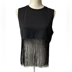 Unisex Black Sleeveless Size Medium Crop Top With Fringe Hem. Oversized. 17.5 Inches Pit To Pit. 24 Inches Long. Nwot. New To Poshmark? Please Sign Up Using Our Code Jaxxandgee And Redeem $10 Off Your First Purchase! Black Sleeveless Edgy Crop Top, Edgy Black Sleeveless Crop Top, Sleeveless Fringe Crop Top For Night Out, Fitted Sleeveless Tank Top With Fringe, Trendy Sleeveless Fringe Tops, Fitted Sleeveless Fringe Tank Top, Sleeveless Fringe Tops For Night Out, Sleeveless Fringe Tank Top For Party, Sleeveless Party Tank Top With Fringe