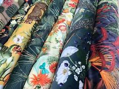 many different types of fabrics are lined up together