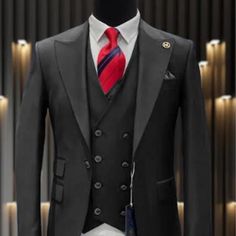 This Modern Fit Suit Features A Wide Peak Lapel, 1 Button Closures, Double Breasted Vest, Side Vents, And Matching Flat Front Pants. Black Slim Fit Office Sets, Business Tuxedo Suit With Button Closure, Classic Tailored Black Sets, Black Double-breasted Tuxedo For Business, Black Single Breasted Suit And Tie Accessories For Semi-formal, Black Single Breasted Set With Notch Lapel, Black Single-breasted Sets With Notch Lapel, Black Single Breasted Sets For Office, Black Single-breasted Sets For Office