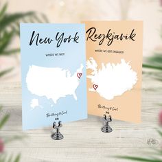 two new york state cards with the names and cities on them, sitting next to each other