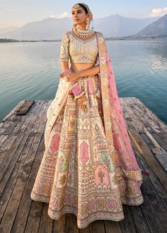 Traditional Bridal Cream Silk embroidered lehenga choli AA130Desc: Style : Circular Lehenga Color : Cteam Fabric : Silk  Work :Haevy Embroidery Wash Care : Dry clean Sleeve Style : Half Sleeve Long Sleeves : Done only in Custom Stitch Sleeves Lining : Done only in Custom Stitch Bust Size : 32 to 42 Inches Occasion : Wedding Mehendi Engagement Reception Ceremonial Baby Shower Party Wear:Semi stitch lehenga choli.Size till 42 inch.heavy bridal lehenga choli Pink lehenga choli ...