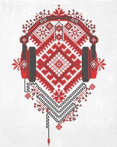 headphones on top of a red and white cross - stitched pattern with snowflakes in the background