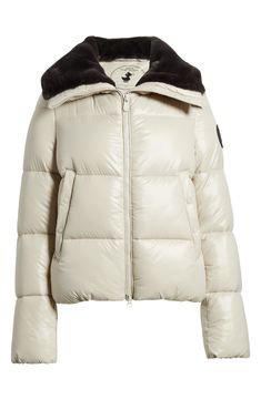 This quilted puffer jacket with soft faux fur lining inside the collar helps repel water to keep you dry and warm. A two-way front zipper along with snap-closure hand-warmer pockets provide the perfect finishing touches. Two-way front-zip closure Stand collar Front snap-welt pockets Water repellent Lined, with recycled polyester fill 100% nylon with textile faux-fur trim Machine wash, line dry Imported Cold Weather Duck Down Puffer Jacket With Padded Collar, Winter White Outdoor Puffer Jacket With Padded Collar, Winter White Puffer Jacket With Padded Collar For Outdoor, Luxury Outdoor Puffer Jacket With Padded Collar, Luxury Puffer Jacket With Padded Collar For Outdoor, Winter White Down Outerwear With Padded Collar, Luxury Duck Down Puffer Jacket With Padded Collar, Luxury Puffer Jacket With Padded Collar For Cold Weather, Long Sleeve Down Puffer Jacket With Faux Fur Lining