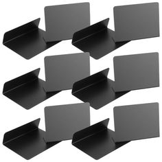 six black cardboard boxes with dividers on each side and one in the middle, all lined up