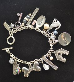 🏆 Bestseller! Tell YOUR story through charms. Each bracelet is custom made to order, personalized to your person and occasion. Unlike others, our bracelets are NOT mass produced and will not look like any other. Each bracelet comes with 10 total charms plus beads and bling to compliment your charms. (Additional charms may be added). This bracelet was made to showcase one's beloved dogs, Shayna, Leslie and Chloe. Truly a 'woman's best friends' ! 🌸Details: * 925 Sterling Silver, incredibly durab Personalized Metal Charm Bracelet For Anniversary, Customized Silver Bracelets For Birthday Gift, Customizable Silver Bracelets For Birthday Gift, Customized Silver Bracelet For Birthday, Silver Bracelet For Birthday Gift, Personalized Silver Charm Bracelet For Birthday, Personalized Silver Charm Bracelet Birthday Gift, Metal Charm Bracelets For Birthday, Metal Charm Bracelets For Anniversary