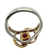 18K African Ruby and Diamond Ring Condition: In good condition with some minor surface wear consistent with age. Ring size: 6.25 Measurements: 13.10mm wide, 5.77mm above the finger Markings: “T864” "750" Metal: 18k White and Rose Gold Weight: 6.89 grams Diamonds: 0.45 carats  African Ruby: 2.22 carats Formal Hallmarked Opal Ring In Fine Jewelry Style, Hallmarked Opal Ring Fine Jewelry For Formal Occasions, Hallmarked Opal Ring For Formal Occasions, Heirloom Ruby Ring With Open Design For Formal Occasions, Heirloom Ruby Open Ring For Formal Occasions, Formal Hallmarked Ruby Ring With Round Band, Hallmarked Open Cluster Ring Fine Jewelry, Formal Gold Opal Ring With Brilliant Cut, Open Ring Signet With Prong Setting For Formal Occasions