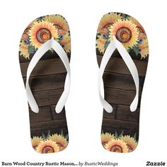 a pair of flip flops with sunflowers on them