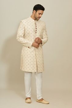 Cream sherwani featuring floral embroidery with zari work all over. Paired with a white churidar. - Aza Fashions Cream Sherwani, White Churidar, Cream Silk, Zari Work, Churidar, Embroidered Silk, Mandarin Collar, Aza Fashion, Floral Embroidery