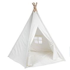 a white teepee tent with the door open