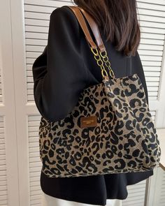 The unique leopard print design makes every detail full of charm, and it can be easily matched for both casual and formal occasions. This bag is not only a fashionable choice, but also a practical must-have item! FEATURES Fashionable leopard print design: unique leopard print pattern, adding a sense of fashion, versatile in various styles. One-shoulder design: easy to carry, suitable for daily travel. Underarm bag style: fits under the armpit, free hands, more convenient to use. High-quality fab Large Capacity Leopard Print Tote Shoulder Bag, Trendy Leopard Print Tote Bag, Leopard Print Shoulder Bag With Animal Design, Leopard Print Large Capacity Shoulder Bag For Everyday Use, Leopard Print Tote Shoulder Bag For Shopping, Casual Leopard Print Tote Shoulder Bag, Everyday Leopard Print Tote Shoulder Bag, Everyday Leopard Print Shoulder Bag With Animal Design, Trendy Leopard Print Bag For Daily Use