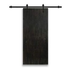 a black curtain hanging on the side of a white wall with two metal bars attached to it