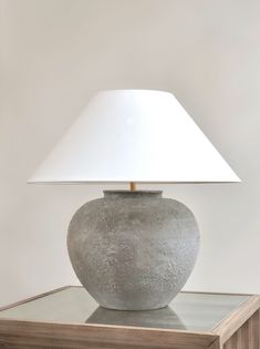 a lamp that is on top of a table