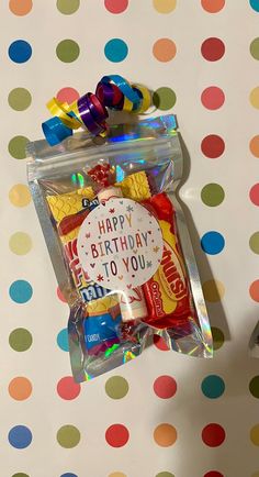 a candy bag with a happy birthday to you sign on it