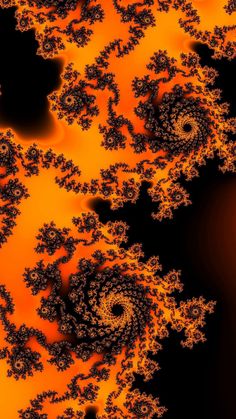 an orange and black background with swirly shapes