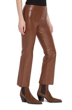 A slightly flared cut maximizes the modern sophistication of ankle-grazing pants shaped from smooth, stretchy faux leather. 27 1/2" length; 16 1/2" leg opening; 10 3/4" front rise; 14 1/2" back rise Extrawide interior smoothing waistband 95% viscose, 5% elastane with polyurethane coating Machine wash, line dry Imported Ankle Pants Women, Wedding Flats, Bootcut Pants, Suit Accessories, Cashmere Coat, Lingerie Romper, Ankle Pants, Leather Coat, Jeans Dress