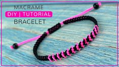 the macrame bracelet is made with pink and black thread